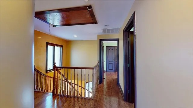 a bathroom with a toilet a sink and shower