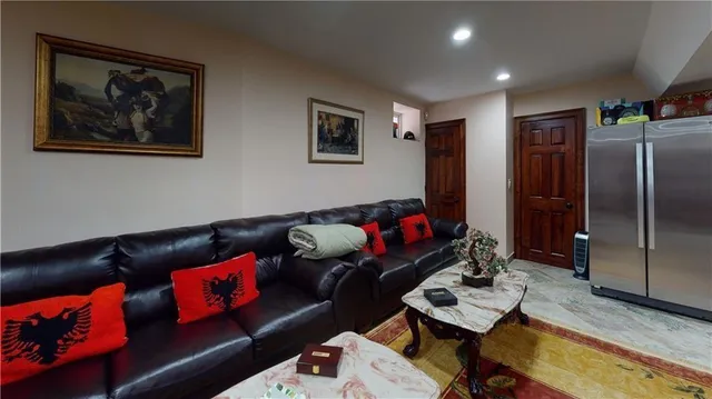 a picture of a bathroom with a shower