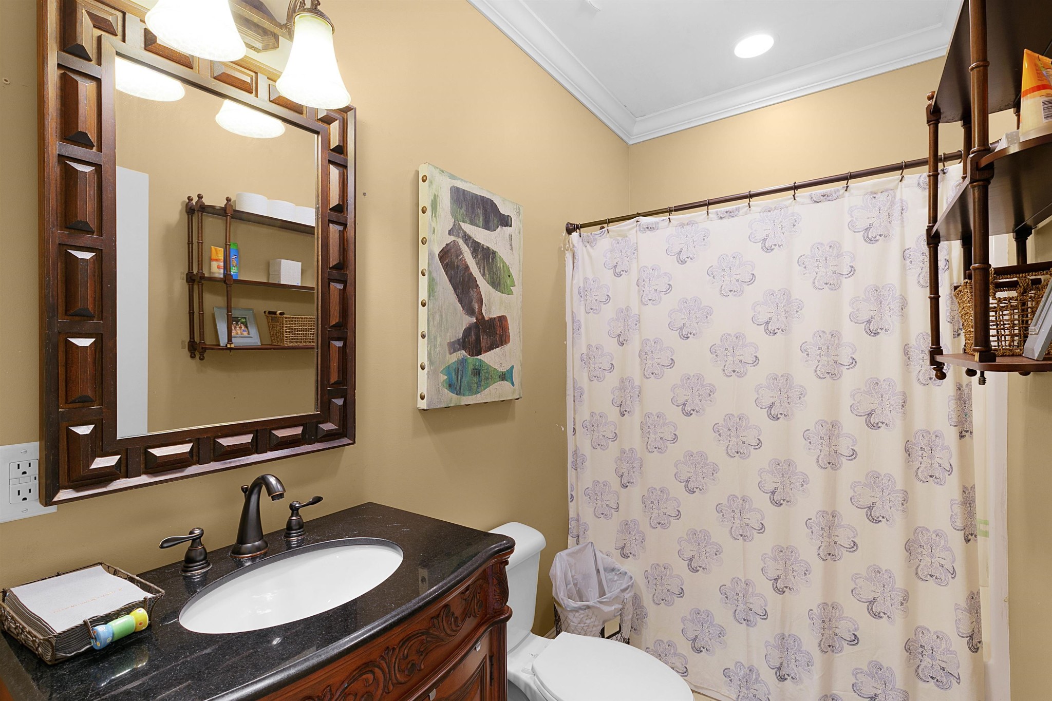 80 Viewpoint Cove Counce, TN 38326 - Photo 14 of 23 a bathroom with a granite countertop sink toilet a mirror and shower curtain