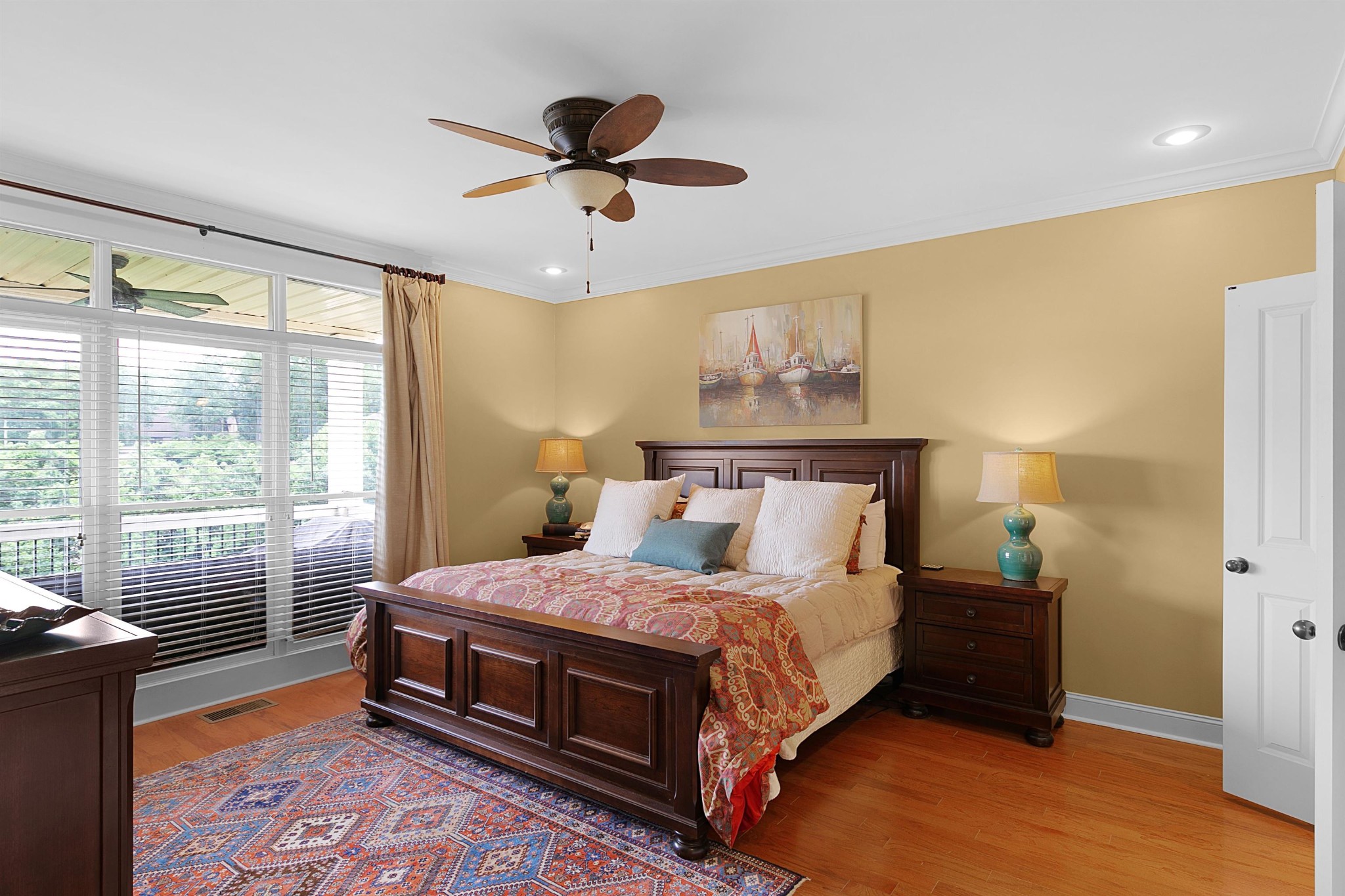 80 Viewpoint Cove Counce, TN 38326 - Photo 8 of 23 a bedroom with a bed and wooden floor