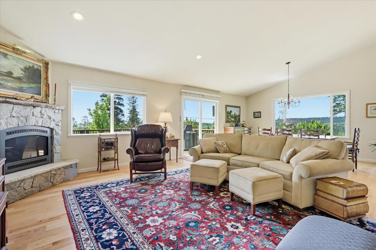 970 Morgan Ranch Drive Grass Valley, CA 95945 - Photo 6 of 76 a living room with furniture or couch and a fireplace