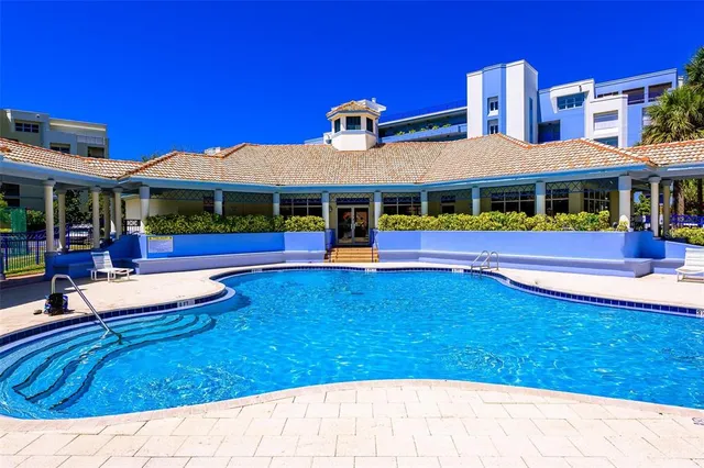 a view of a house with swimming pool