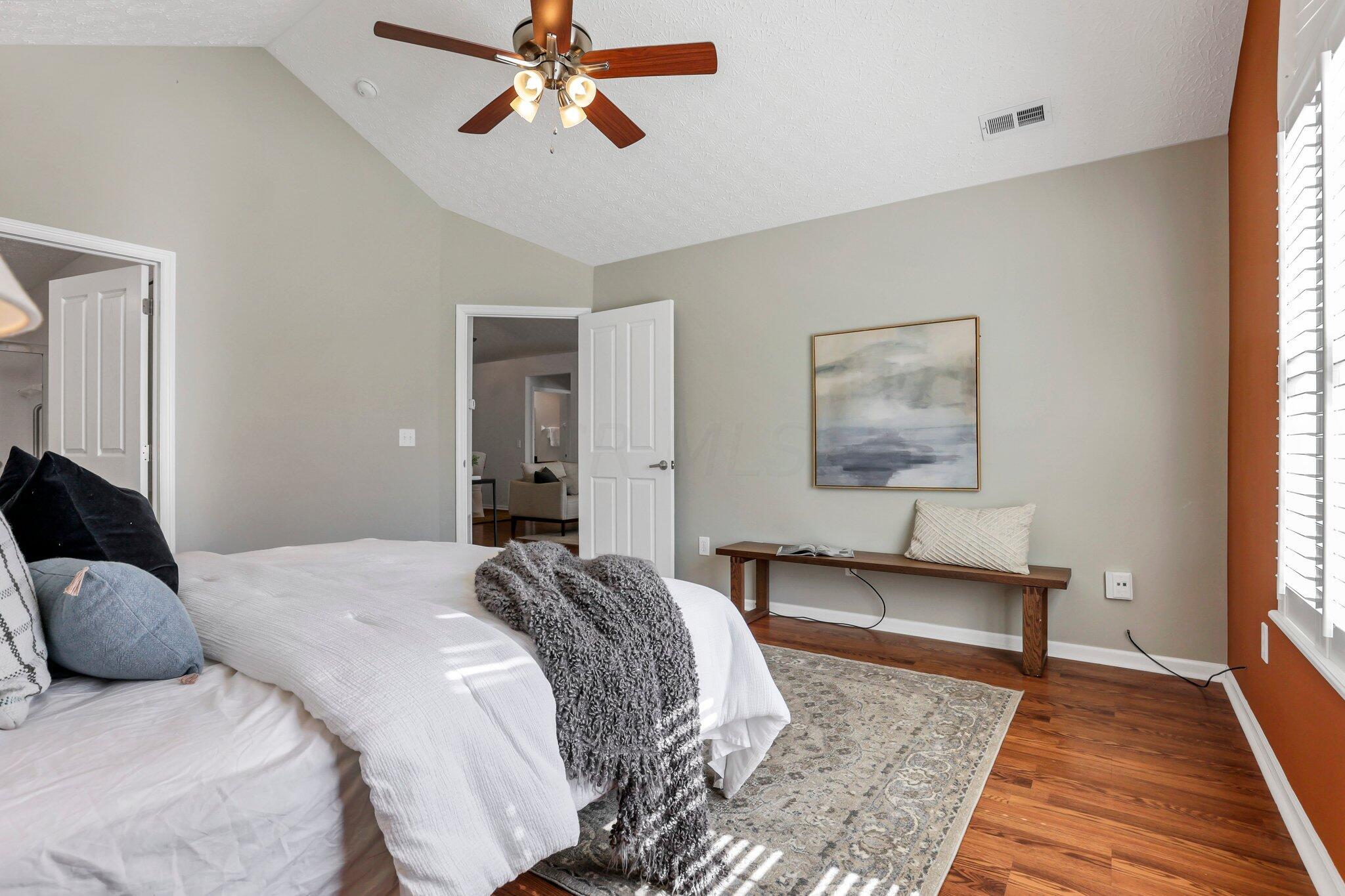 4223 Cobbler Road, Unit 16422 New Albany, OH 43054 - Photo 13 of 36 Primary suite with vaulted ceilings and attached full bathroom.