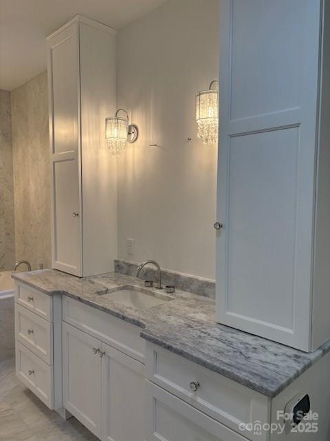 73 Wisdom Cove Road Flat Rock, NC 28731 - Photo 18 of 41 a bathroom with a granite countertop sink and a mirror