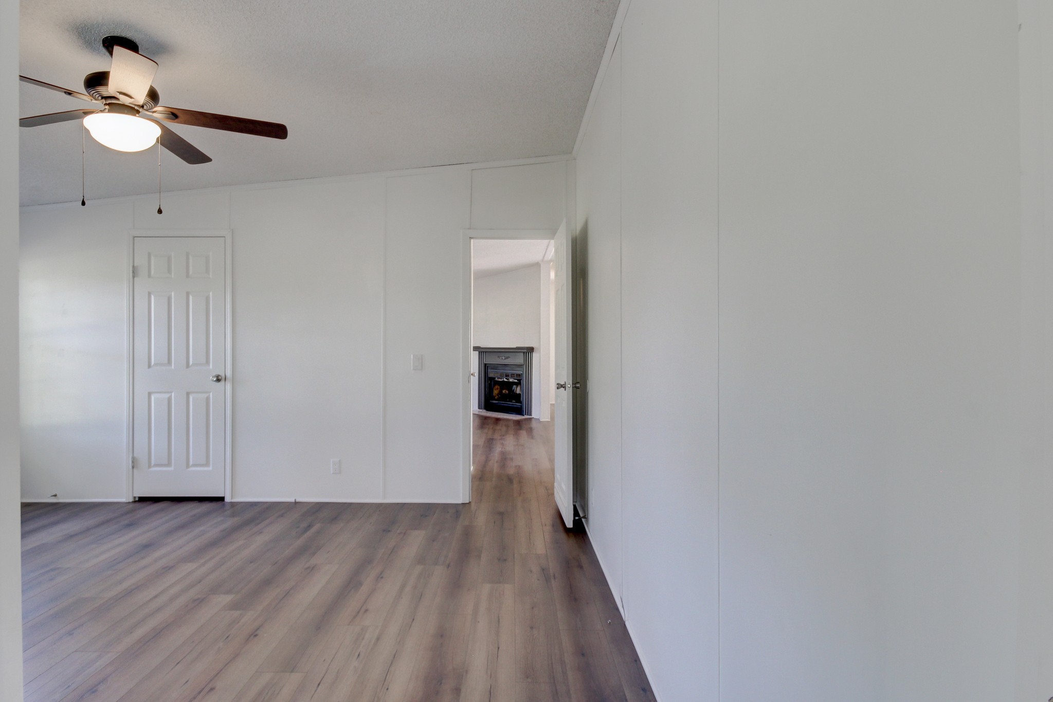 145 Trotter Road Cunningham, TN 37052 - Photo 22 of 48 a view of a room with wooden floor and chandelier