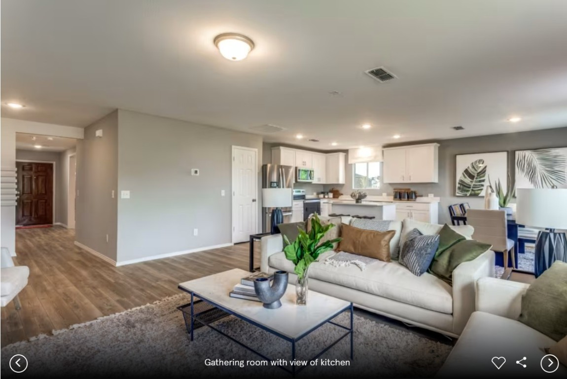 120 Golden Bell Way Buda, TX 78610 - Photo 9 of 10 a living room with furniture kitchen and a table