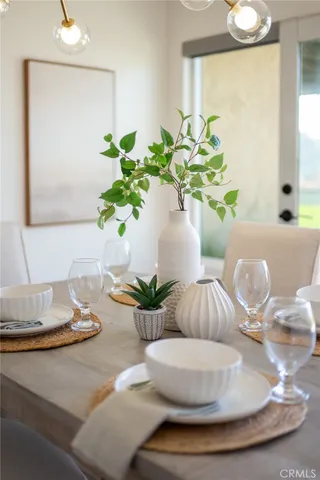 a vase of flowers sitting on a table