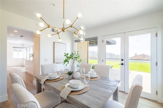 a kitchen with a stove a sink and a window