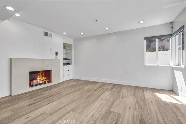 a bed room with a bed and a table