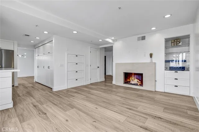 a bedroom with a bed and a table