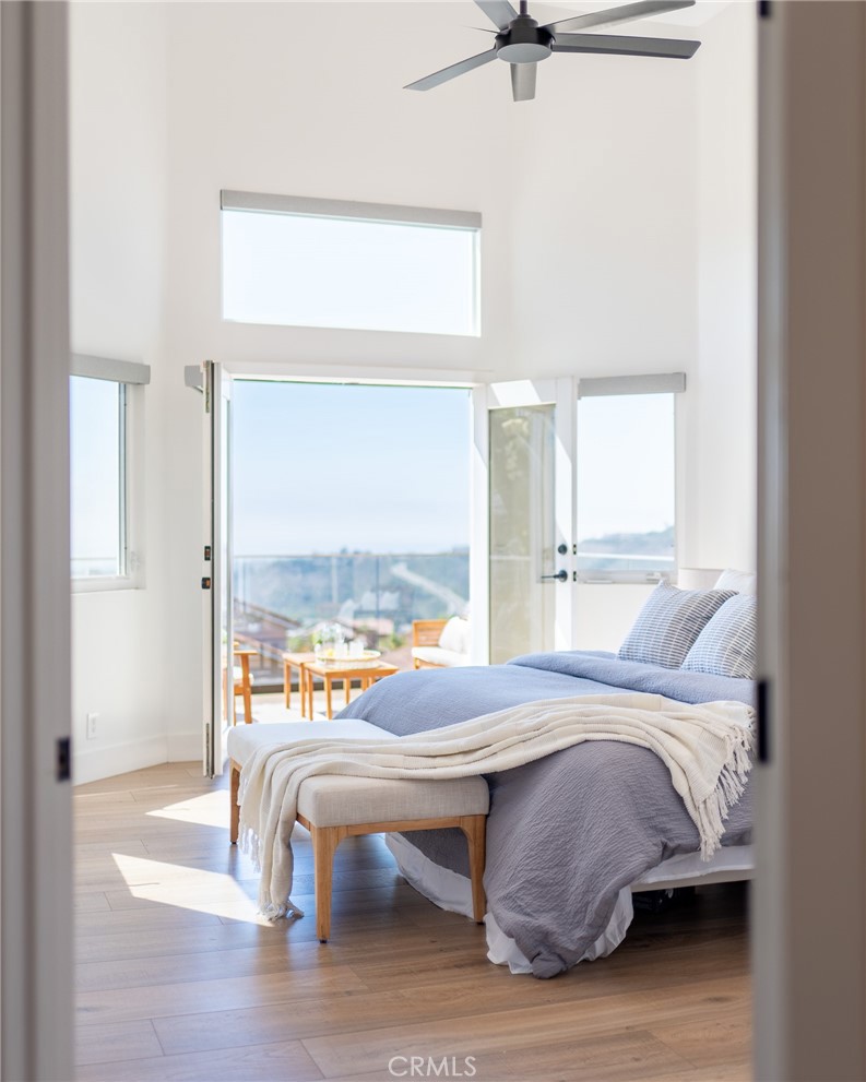 27 Burriana San Clemente, CA 92672 - Photo 28 of 66 a bed room with a bed and a table