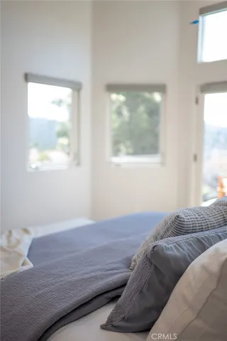 a view of a swimming pool with a table and chairs