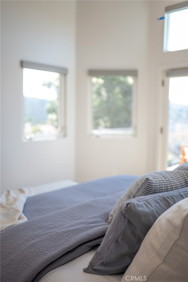 27 Burriana San Clemente, CA 92672 - Photo 31 of 66 a bedroom with a bed and a window