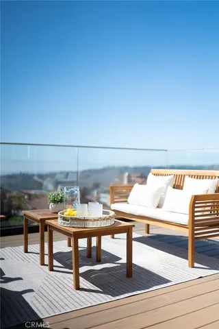 a bedroom with a bed and a ceiling fan