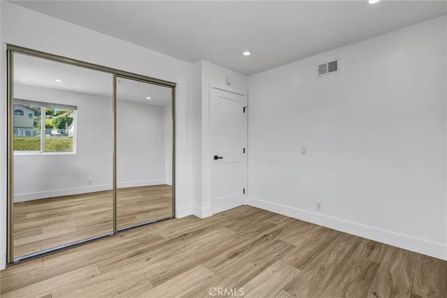 an aerial view of house with ocean view