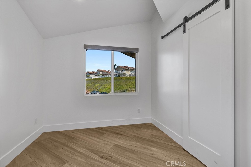 27 Burriana San Clemente, CA 92672 - Photo 53 of 66 a view of walk in closet with window
