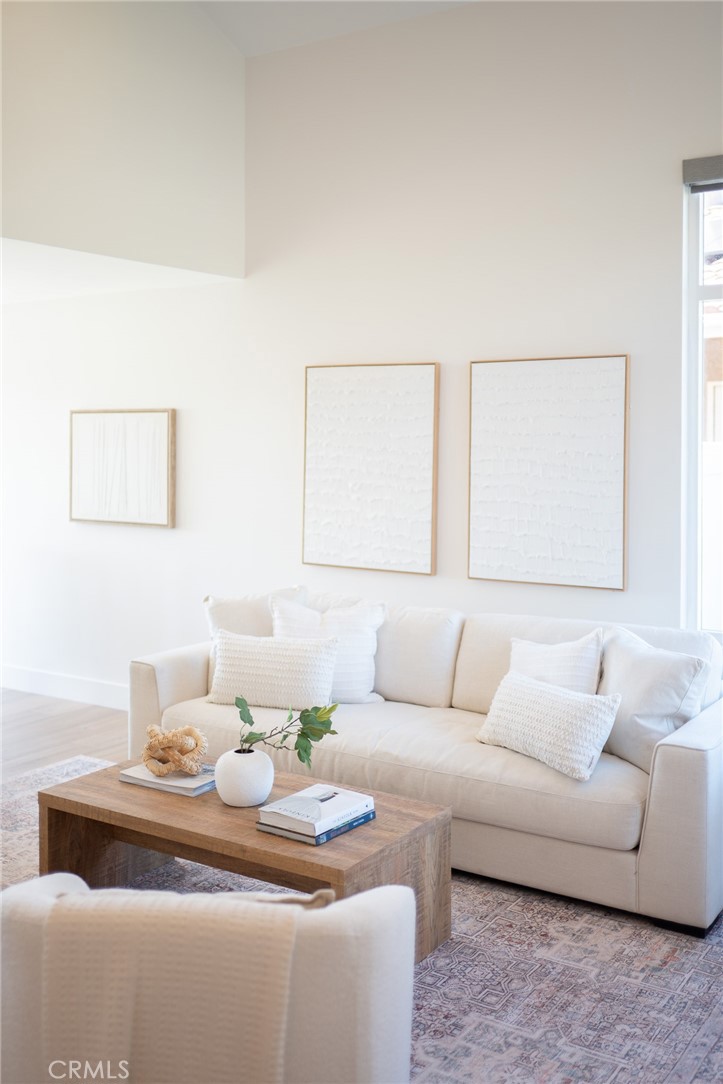27 Burriana San Clemente, CA 92672 - Photo 7 of 66 a living room with furniture and a couch