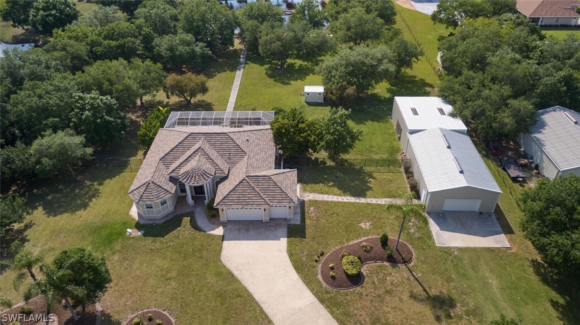 2050 Balsey Road Alva, FL 33920 - Photo 1 of 35 an aerial view of a house with garden space ocean view