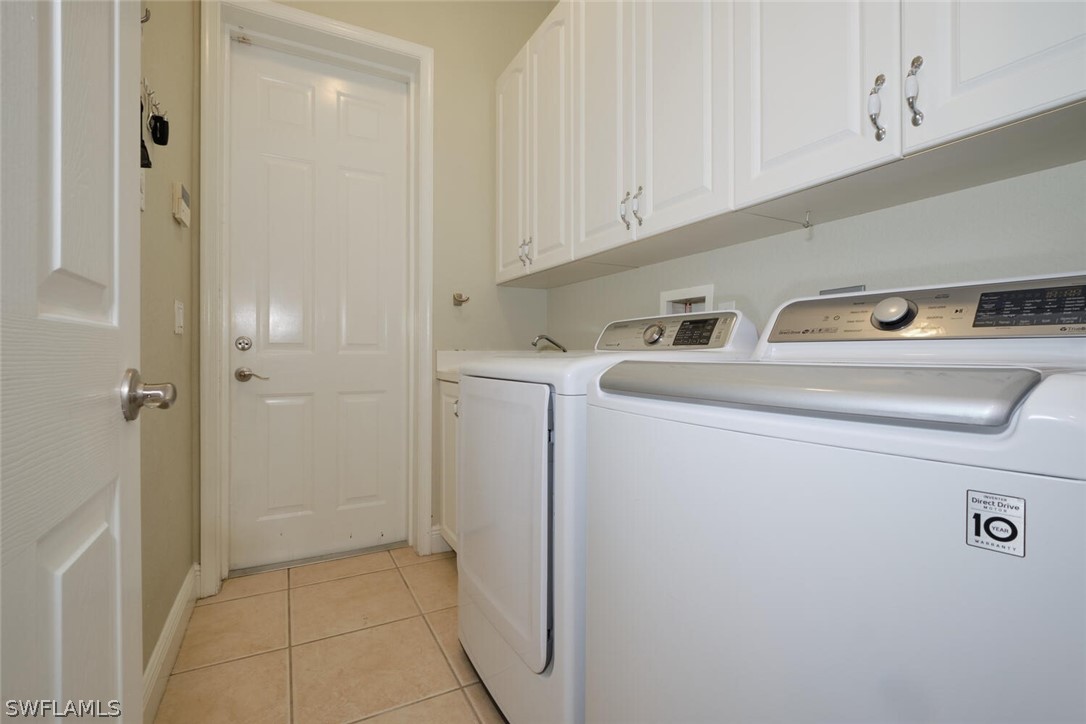 2050 Balsey Road Alva, FL 33920 - Photo 18 of 35 a utility room with dryer and washer