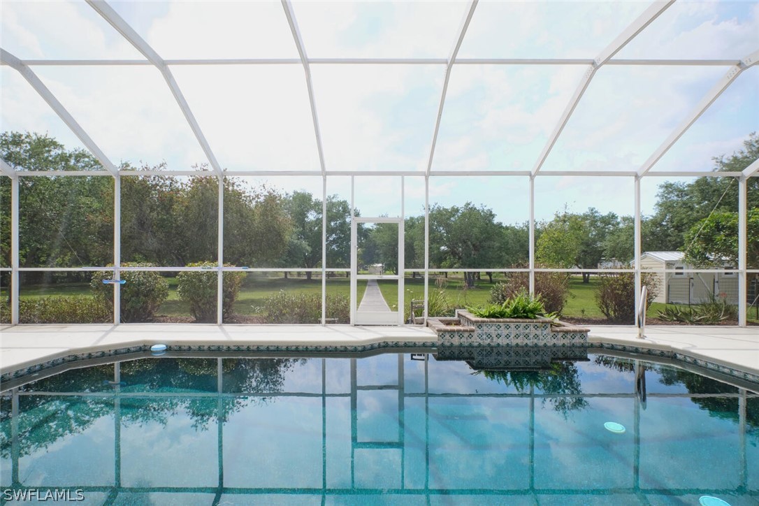 2050 Balsey Road Alva, FL 33920 - Photo 23 of 35 a room with pool table and chairs