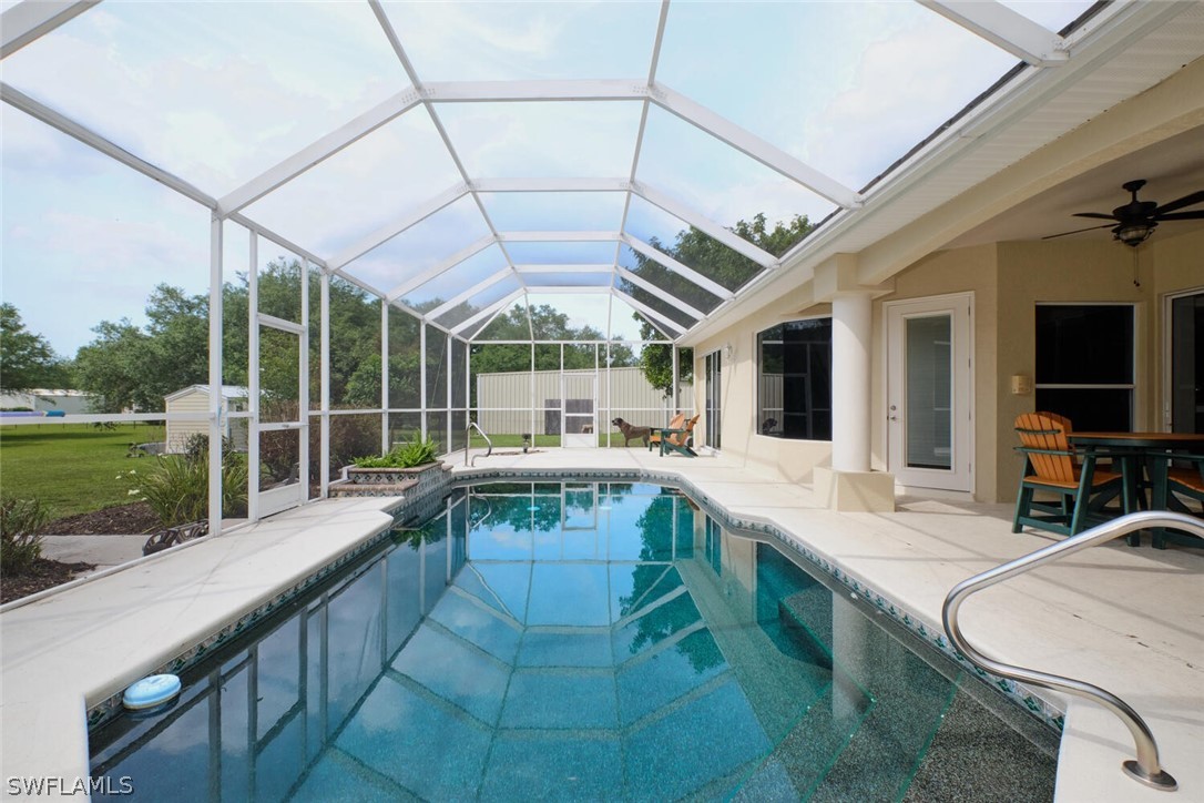 2050 Balsey Road Alva, FL 33920 - Photo 24 of 35 a large white kitchen with a large window