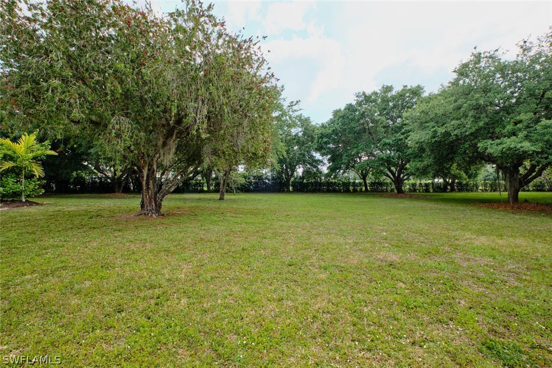 2050 Balsey Road Alva, FL 33920 - Photo 35 of 35 a view of outdoor space with deck and yard