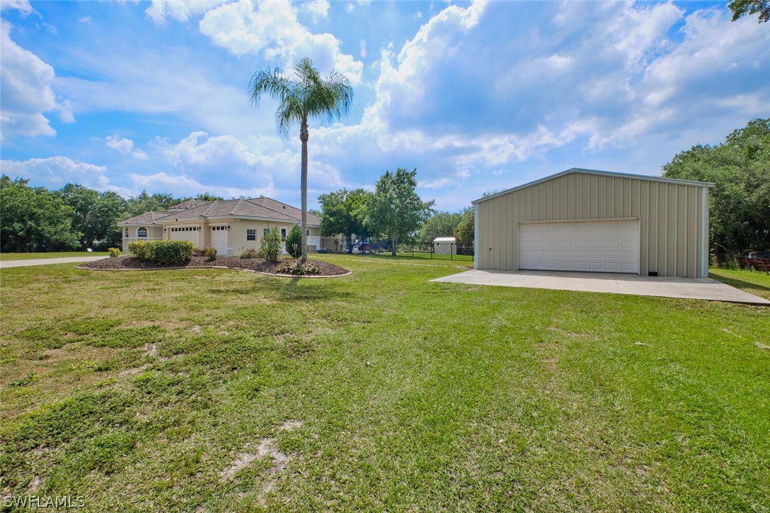 2050 Balsey Road Alva, FL 33920 - Photo 4 of 35 a view of a garden