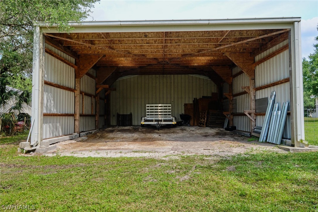 2050 Balsey Road Alva, FL 33920 - Photo 6 of 35 a view of room with a fireplace
