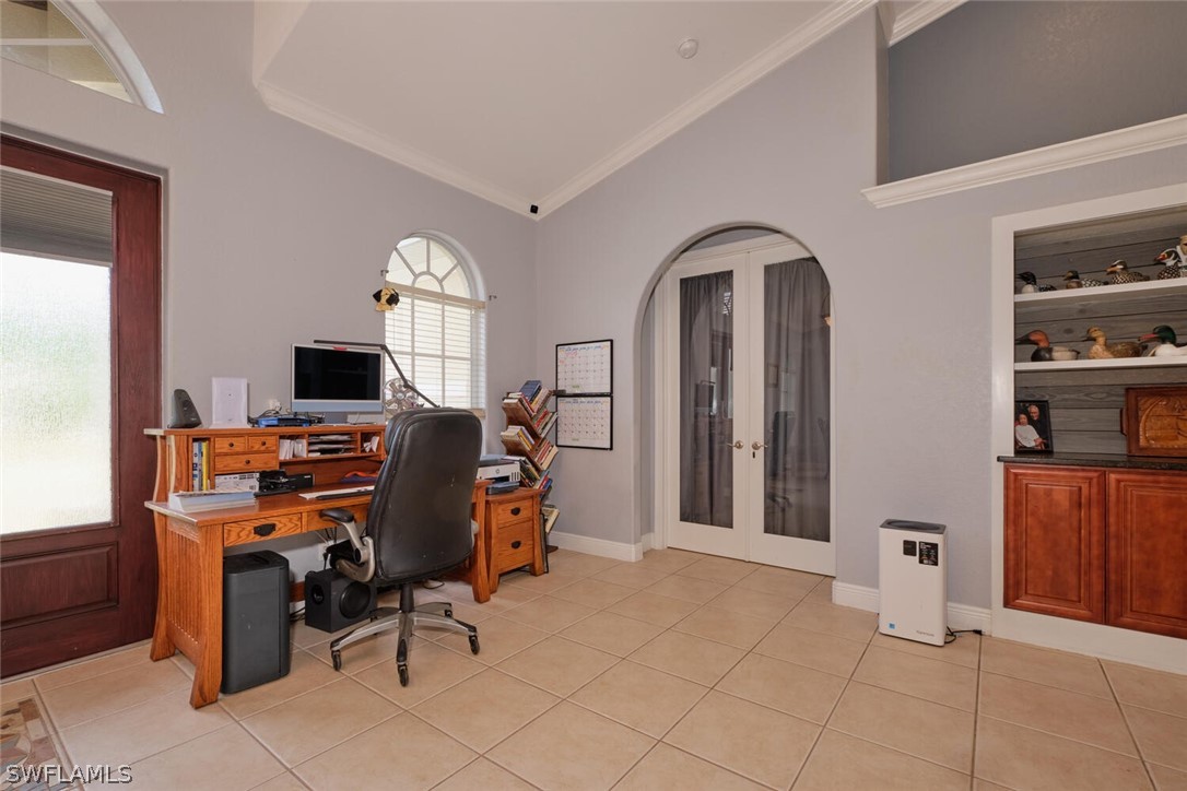 2050 Balsey Road Alva, FL 33920 - Photo 9 of 35 a view of a workspace with furniture and a window