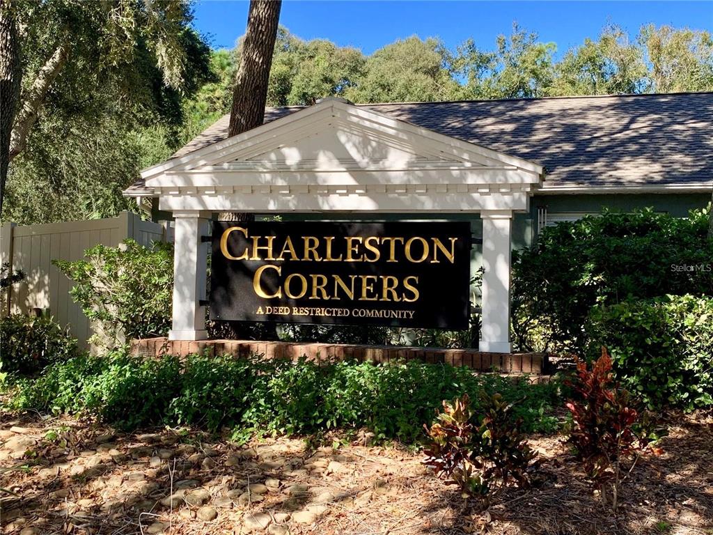 8553 Manassas Road Tampa, FL 33635 - Photo 33 of 33 a sign that is sitting on a brick wall