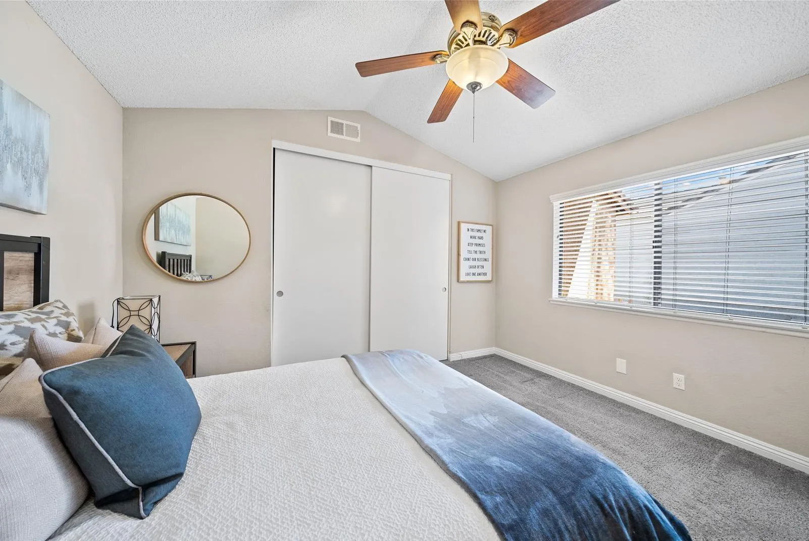 27823 Antelope Road Menifee, CA 92585 - Photo 16 of 49 a bedroom with a bed and a chandelier
