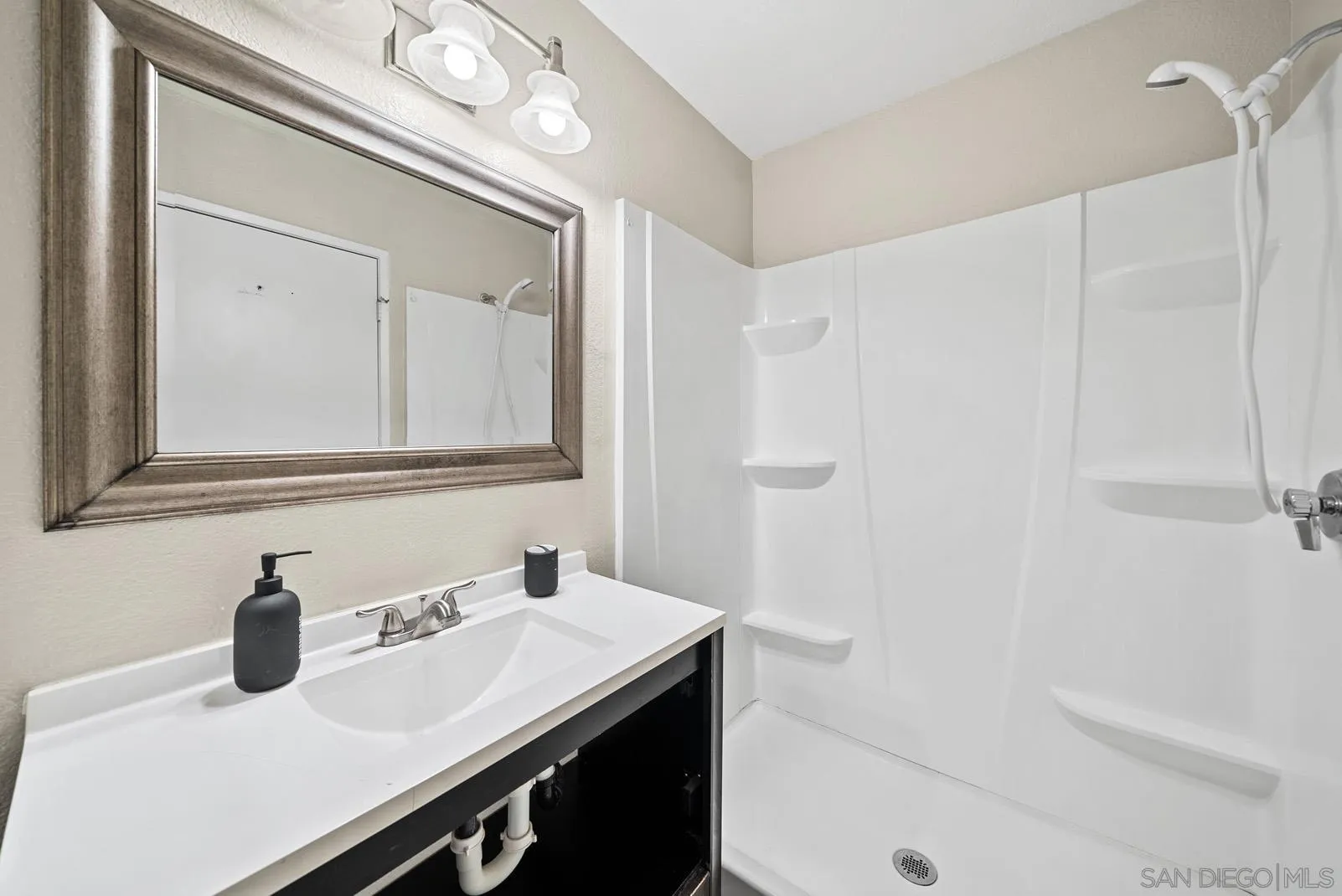 27823 Antelope Road Menifee, CA 92585 - Photo 19 of 49 a bathroom with a sink and a mirror