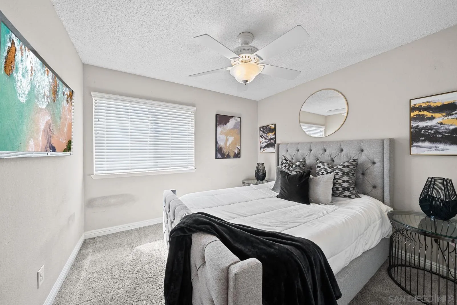 27823 Antelope Road Menifee, CA 92585 - Photo 20 of 49 a bedroom with a bed and a chandelier