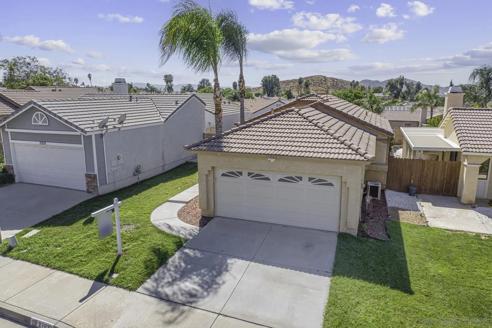 27823 Antelope Road Menifee, CA 92585 - Photo 2 of 49 a view of a house with a yard and furniture