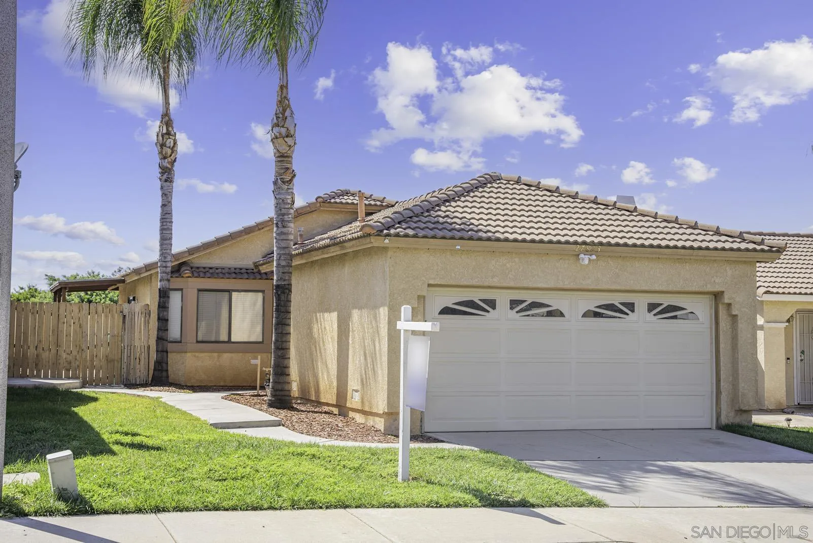 27823 Antelope Road Menifee, CA 92585 - Photo 3 of 49 a front view of a house with a yard