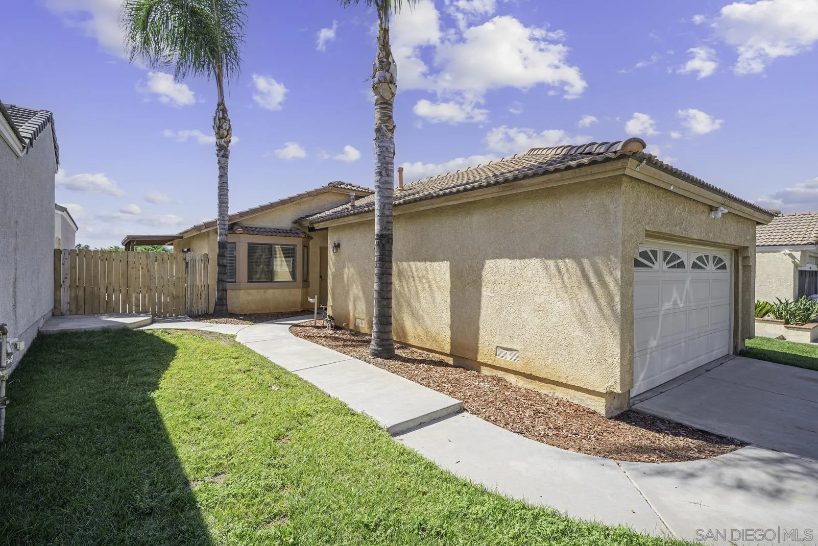 27823 Antelope Road Menifee, CA 92585 - Photo 33 of 49 a front view of a house with garden