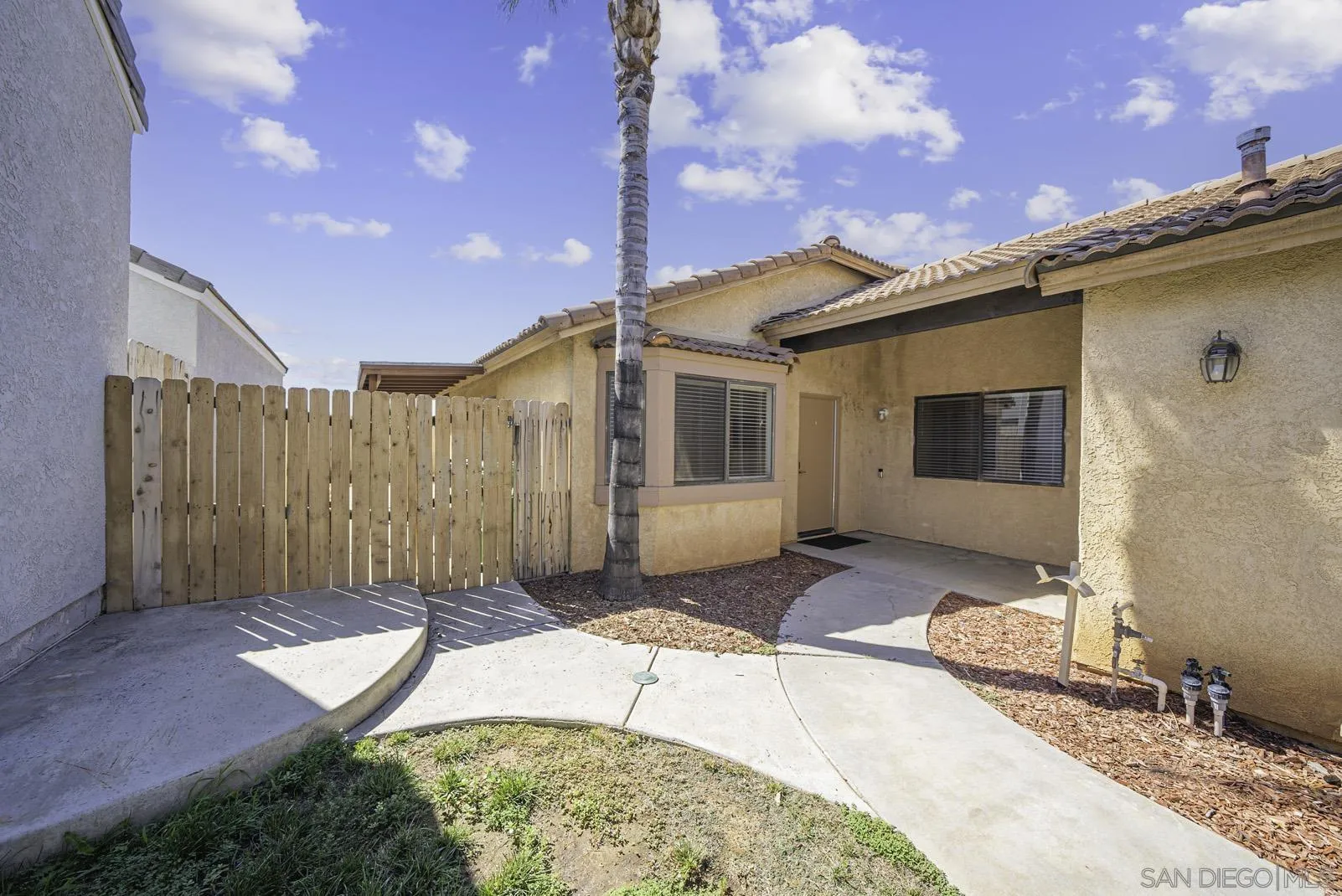 27823 Antelope Road Menifee, CA 92585 - Photo 4 of 49 a front view of a house with a yard