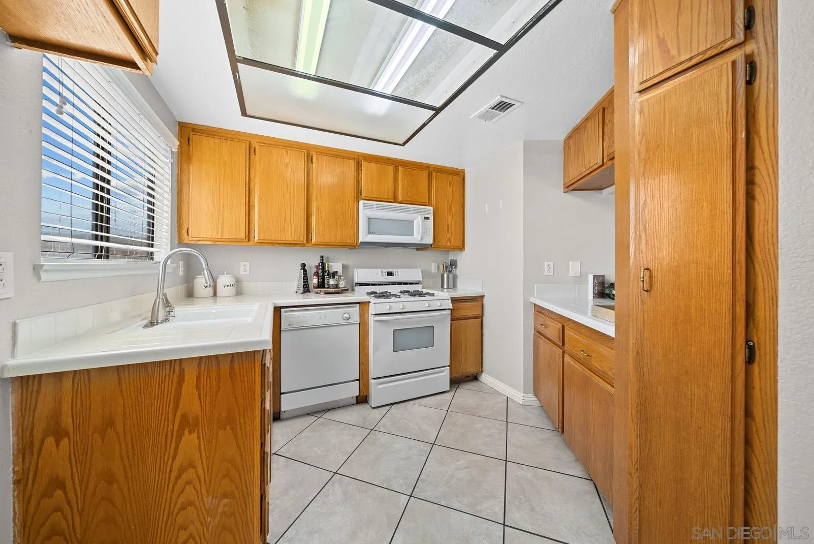 27823 Antelope Road Menifee, CA 92585 - Photo 6 of 49 a kitchen with a sink cabinets and window