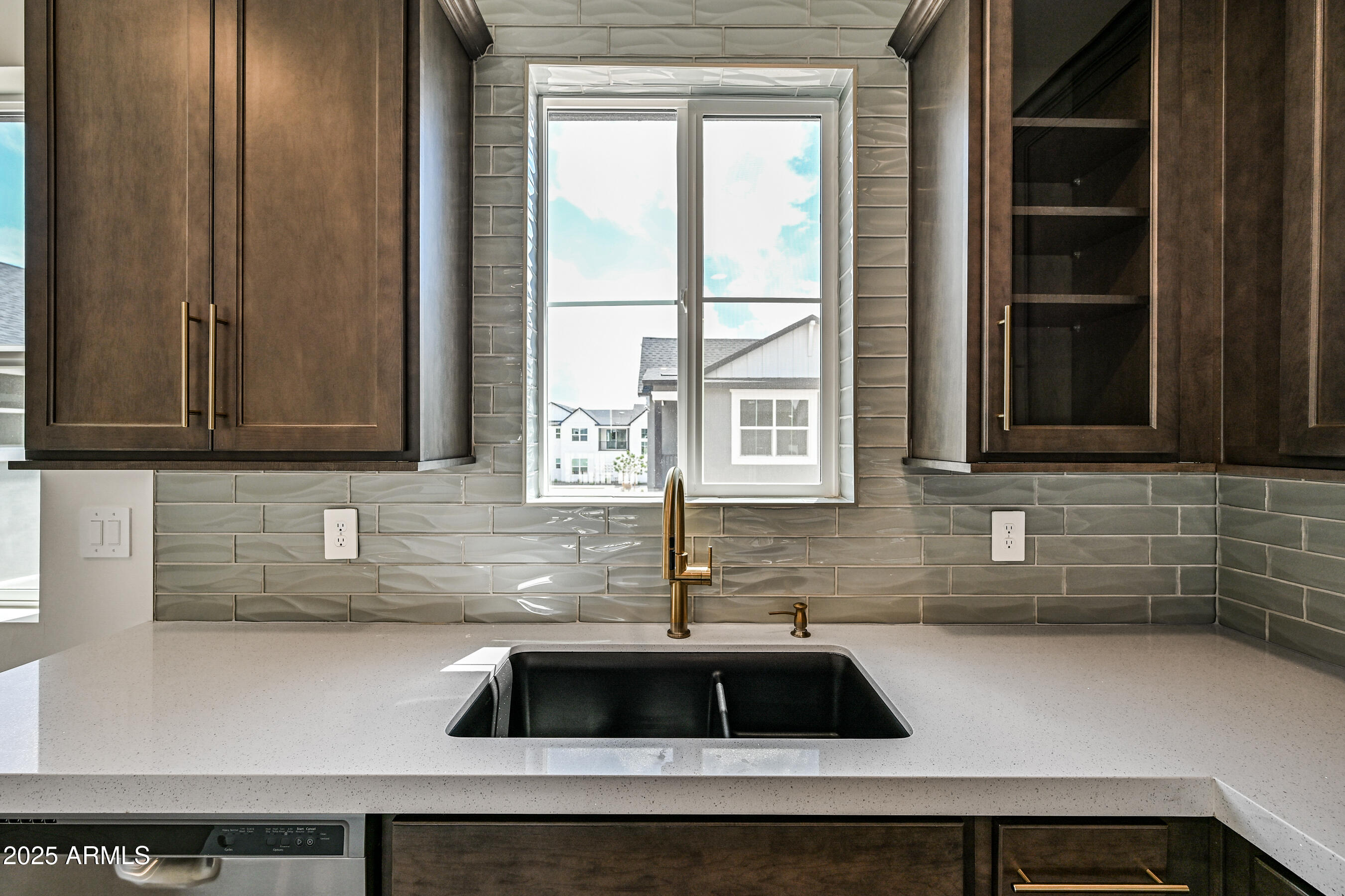 11300 North Casa Dega Drive, Unit 1061 Surprise, AZ 85388 - Photo 16 of 45 a kitchen with a sink and a window