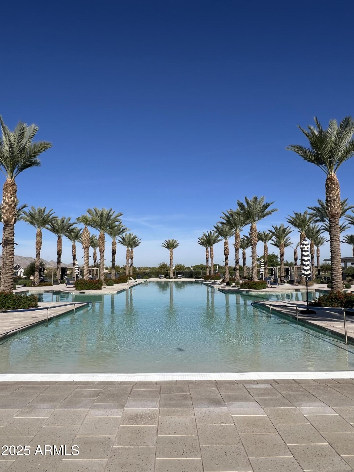 11300 North Casa Dega Drive, Unit 1061 Surprise, AZ 85388 - Photo 32 of 45 a view of a lake with houses