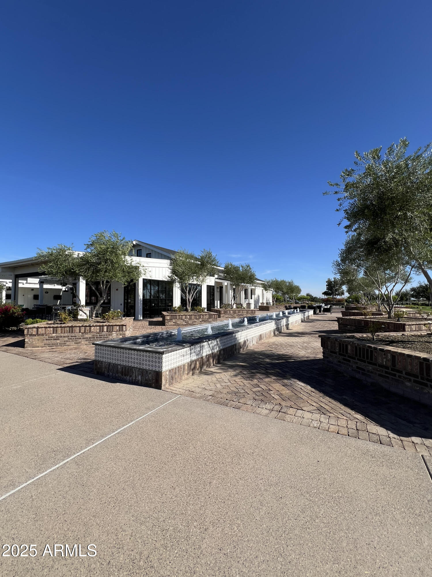 11300 North Casa Dega Drive, Unit 1061 Surprise, AZ 85388 - Photo 40 of 45 a view of a patio with swimming pool and sitting area