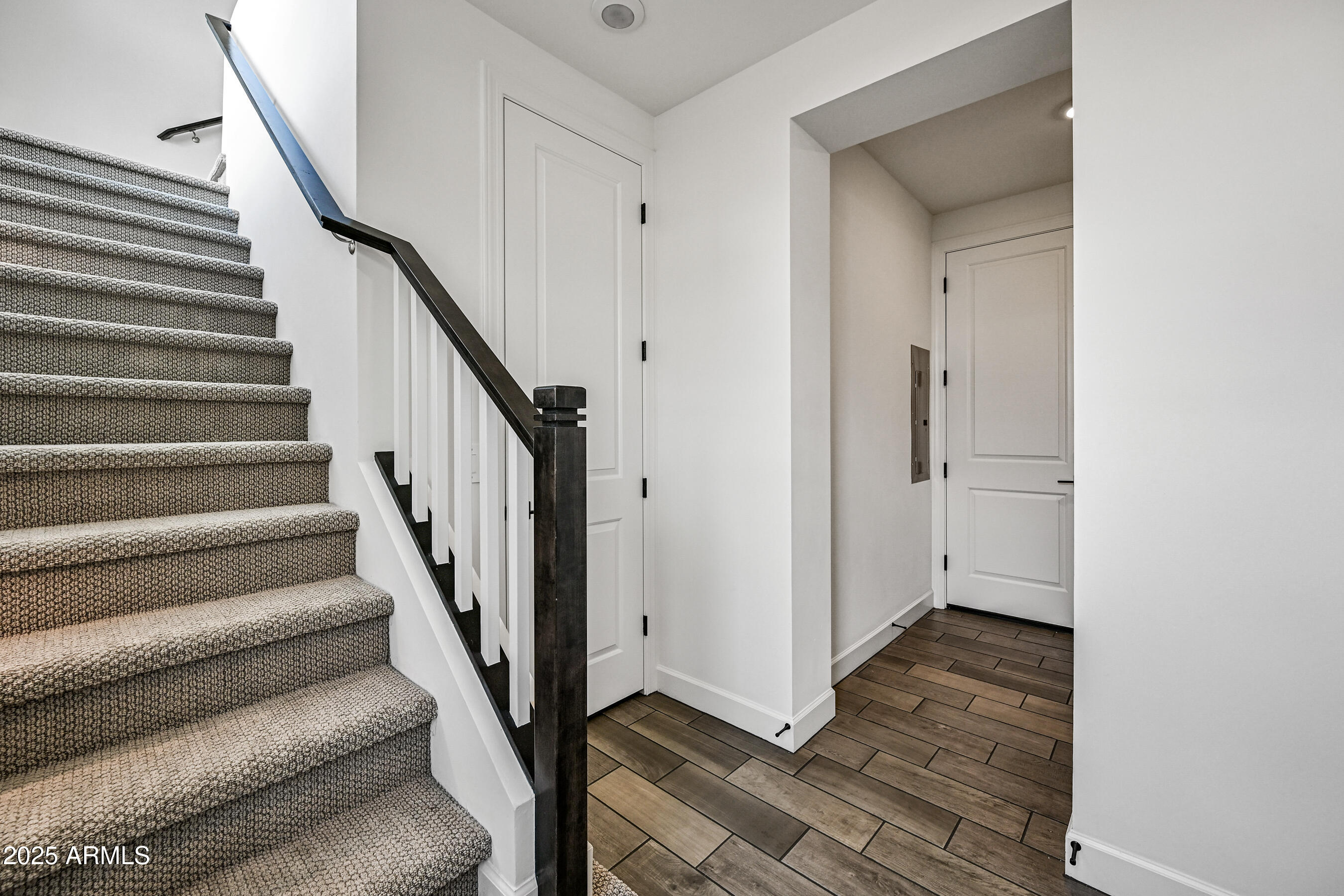 11300 North Casa Dega Drive, Unit 1061 Surprise, AZ 85388 - Photo 6 of 45 a view of entryway with wooden floor and stairs