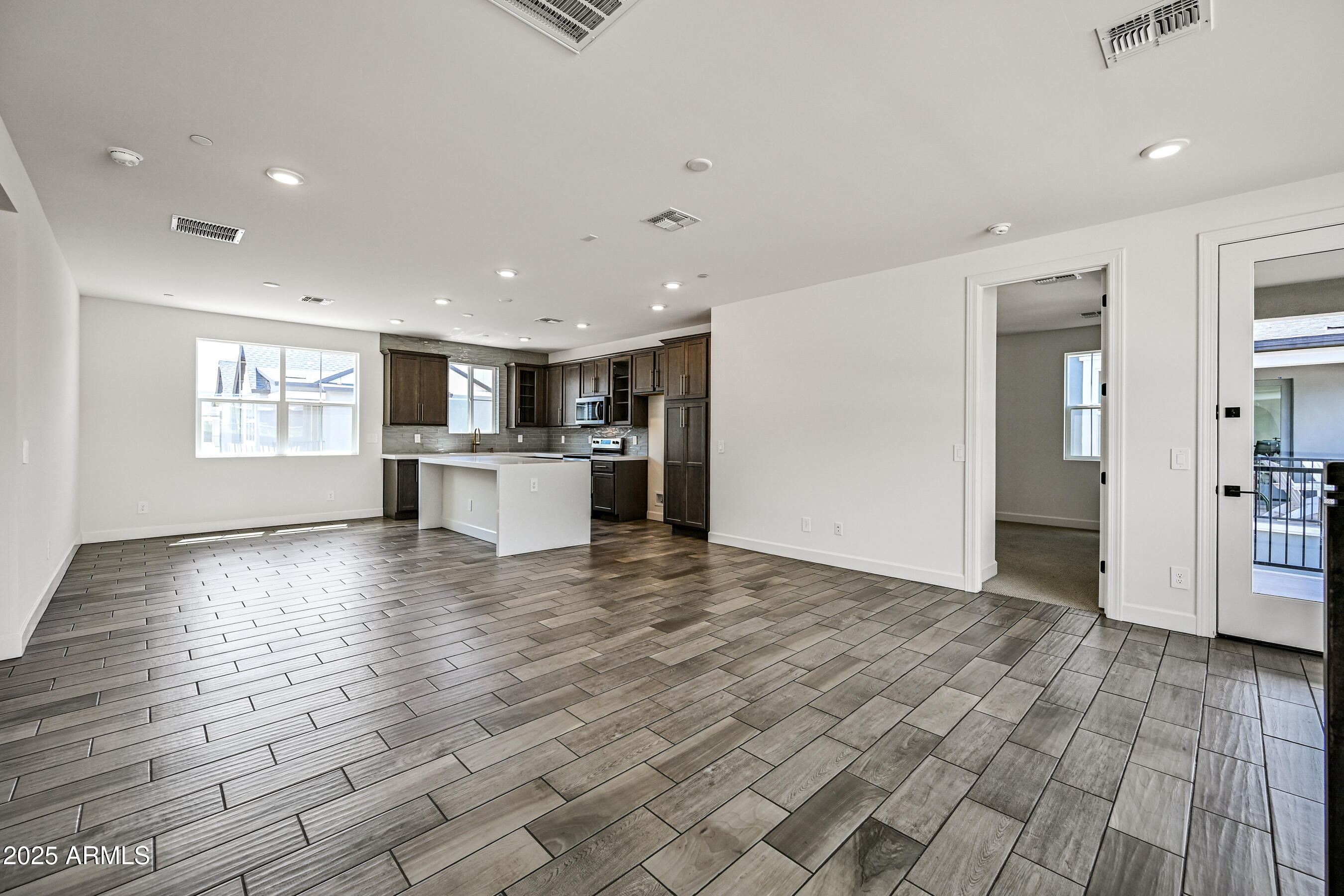 11300 North Casa Dega Drive, Unit 1061 Surprise, AZ 85388 - Photo 7 of 45 a view of kitchen with a sink and a refrigerator