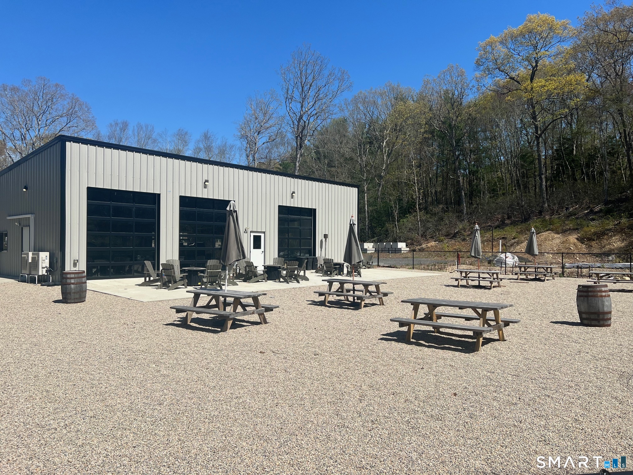 972 Long Cove Road Ledyard, CT 06335 - Photo 3 of 13 a view of swimming pool with outdoor seating and plants