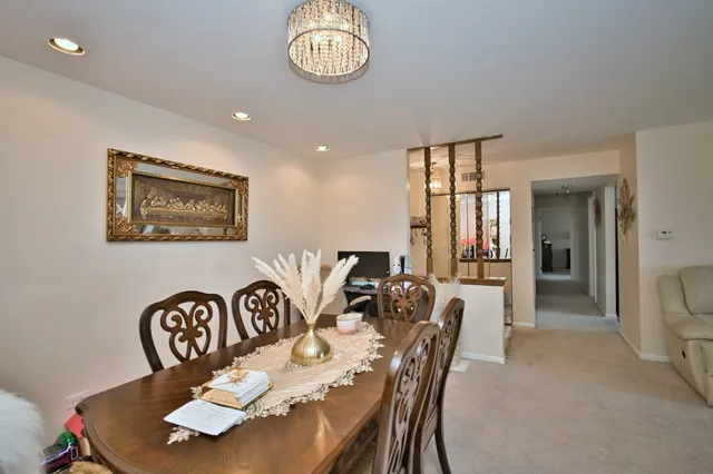 a bedroom with furniture and a flat screen tv