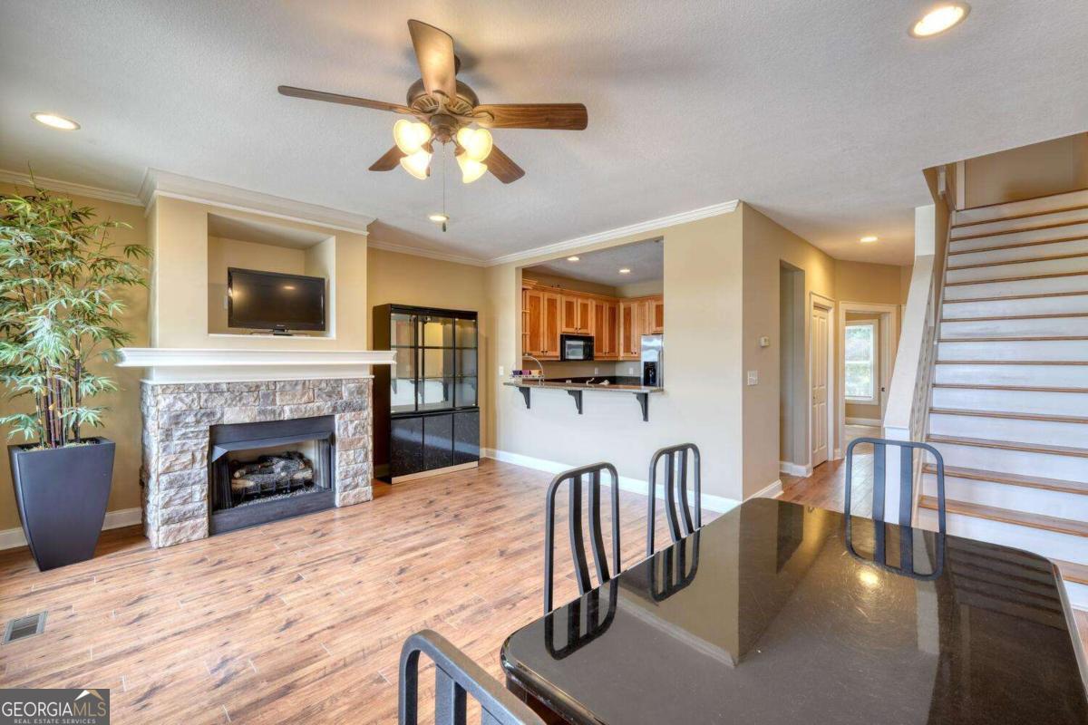 1401 Lakeside Road, Unit 502 Hiawassee, GA 30546 - Photo 13 of 46 a view of a livingroom with furniture and a fireplace