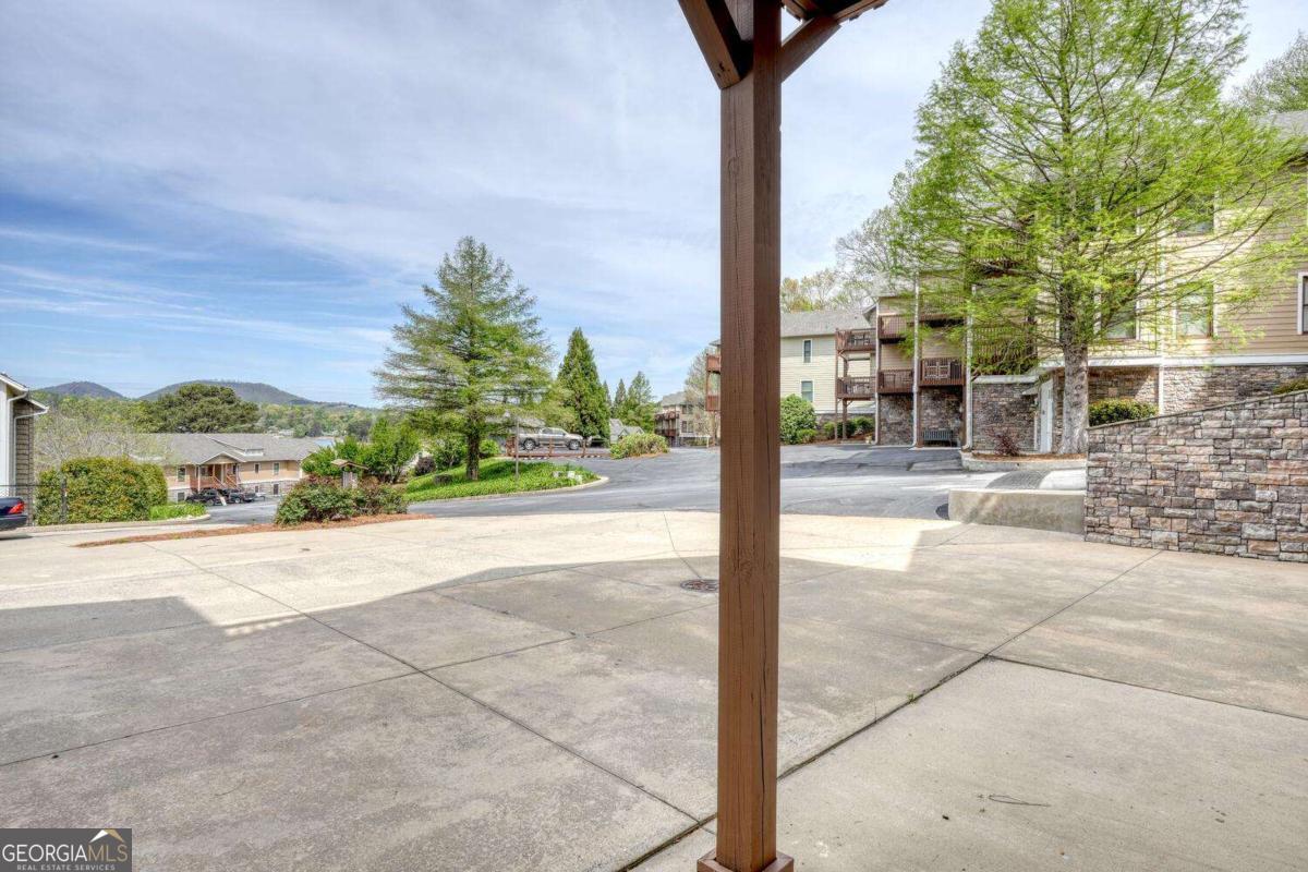 1401 Lakeside Road, Unit 502 Hiawassee, GA 30546 - Photo 9 of 46 a view of a road from a balcony