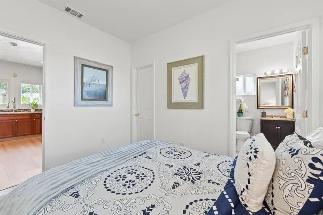 a utility room with cabinets washer and dryer