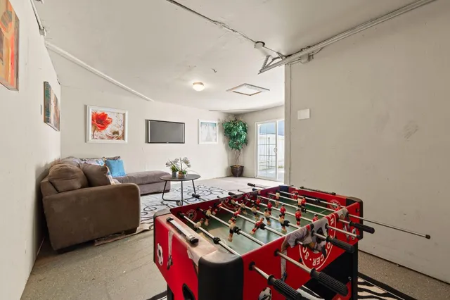 a living room with furniture and a couch