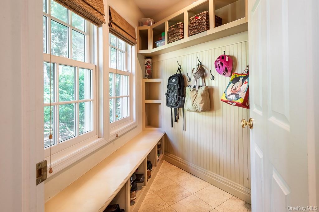 5 Sturgis Road Mount Vernon, NY 10552 - Photo 11 of 25 a very nice looking room with a big window and a potted plant